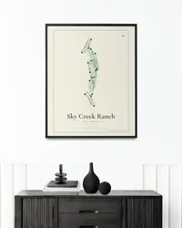 Sky Creek Ranch map print, framed in a room